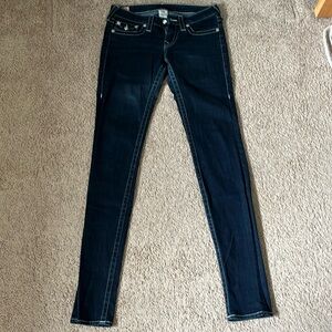 True Religion size 27 sunny jean with jewel button detailing.
